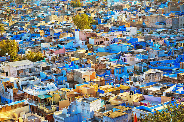 Aerial view of dense blue houses representing communities served